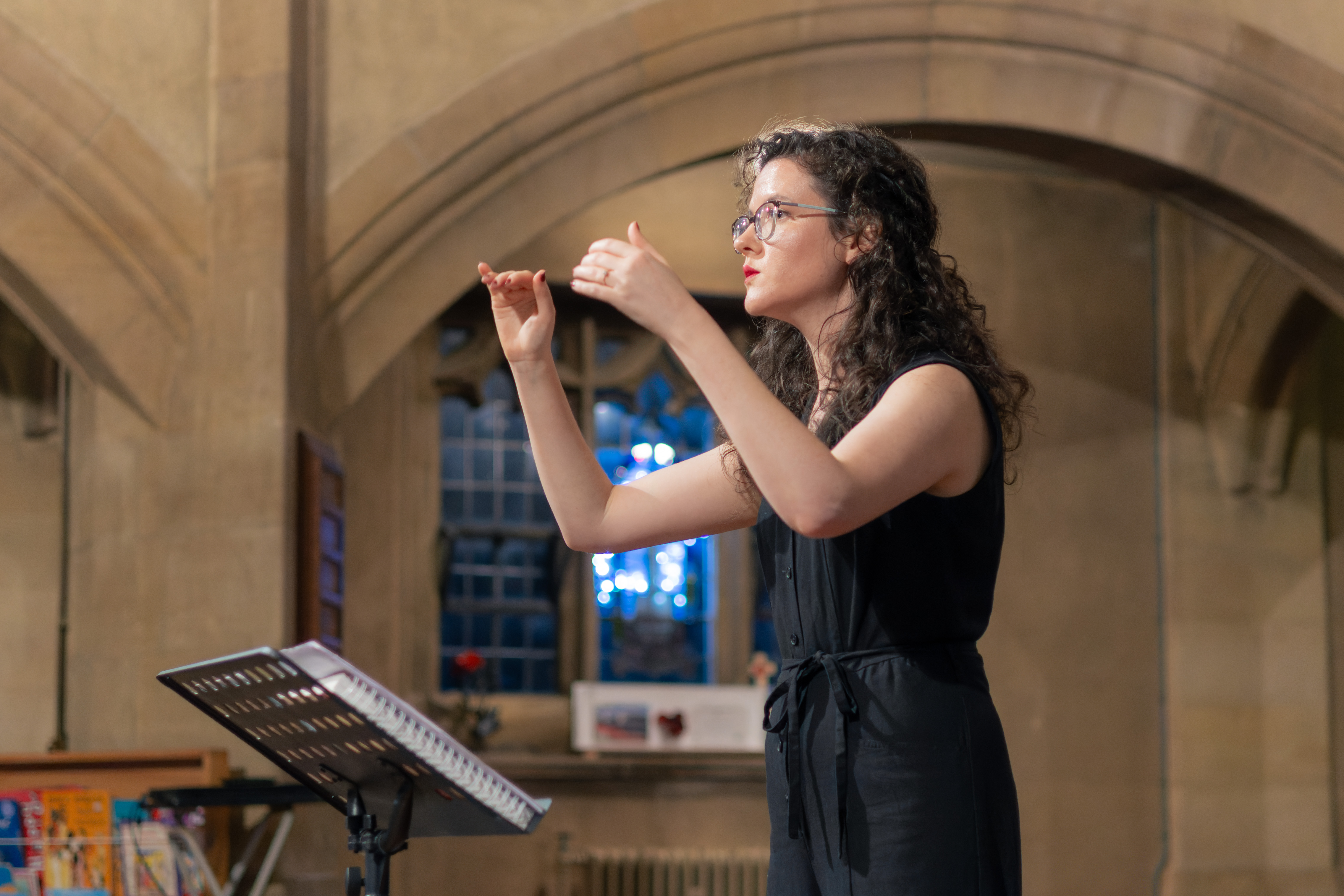 Sierra conducting in a church